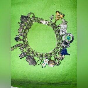 VINTAGE gorgeous SOLID .925 Silver Charm Bracelet with many charms 
56grams